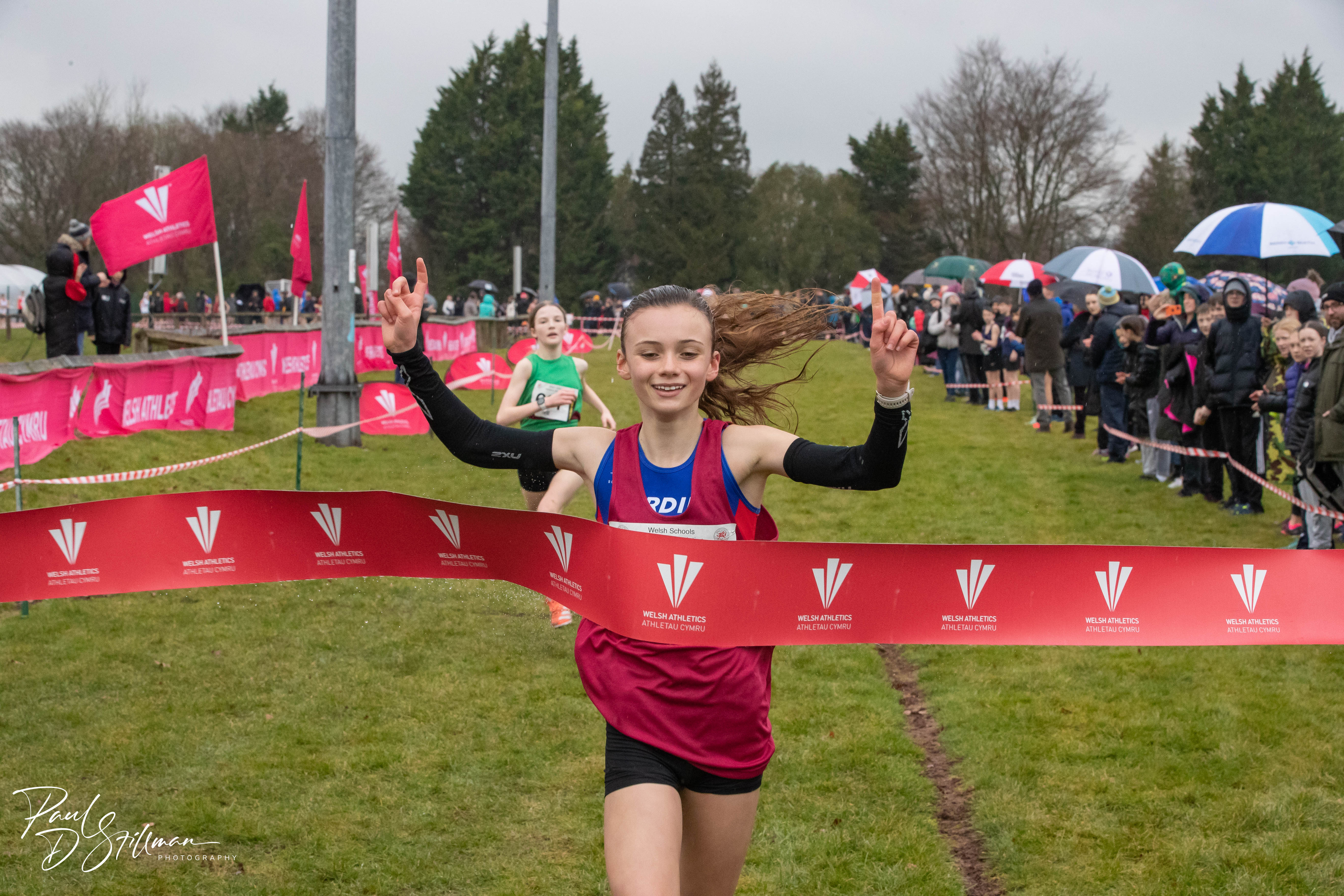 Bryony Boyce takes the Welsh Schools Cross Country title.